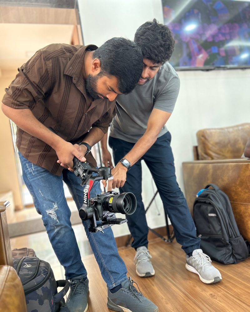 Two of our crew setting up a camera on a gimbal